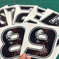 Adesivi Numeri Gara con Teschio – Skull Racing Stickers 0-9 per Moto, Auto, Caschi, Kart, Bici – Vinile Waterproof UV Resistant – Stile Estremo 0448
