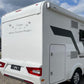 Adesivo sticker camper frase frasi CASA È DOVE LA PARCHEGGI -caravan roulotte- accessori grafiche fiancata scegli colore cod. 0426 (cm 56 x 25)