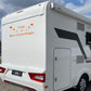Adesivo sticker camper frase frasi CASA È DOVE LA PARCHEGGI -caravan roulotte- accessori grafiche fiancata scegli colore cod. 0426 (cm 56 x 25)