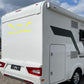 Adesivo sticker camper frase frasi CASA È DOVE LA PARCHEGGI -caravan roulotte- accessori grafiche fiancata scegli colore cod. 0426 (cm 56 x 25)