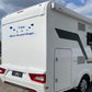 Adesivo sticker camper frase frasi CASA È DOVE LA PARCHEGGI -caravan roulotte- accessori grafiche fiancata scegli colore cod. 0426 (cm 56 x 25)